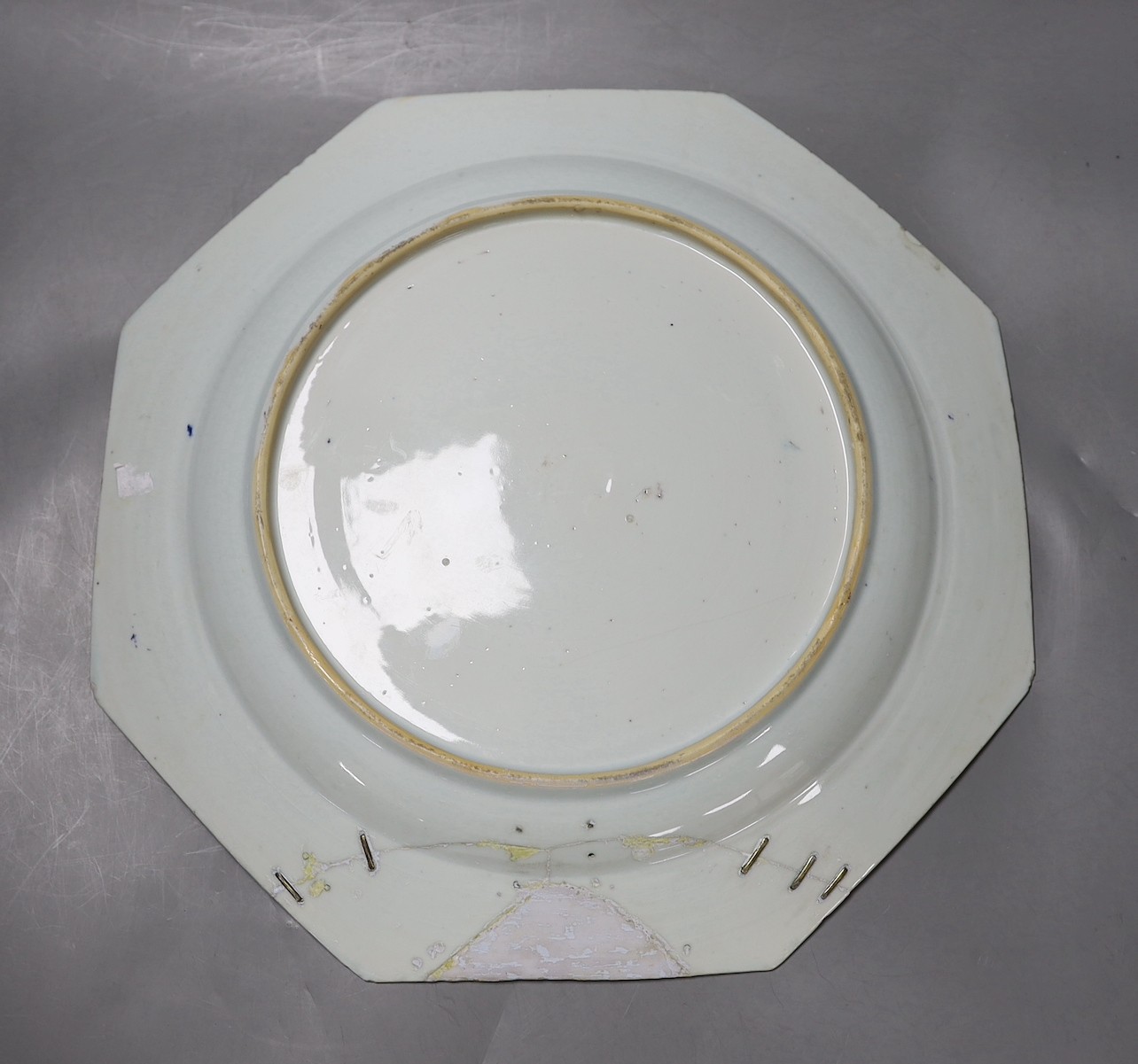 A Chinese blue and white octagonal plate with botanical decoration, together with another Chinese Imari plate with landscape decoration, 31cm diameter